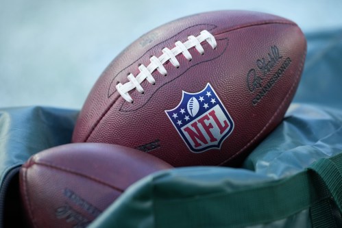 FILE - Footballs are seen before an NFL football game in Philadelphia on Jan. 4, 2026. (AP Photo/Matt Slocum, File)