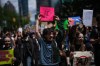 People participate in a march in Vancouver to protest the opening of AI data centres on Saturday, June 27, 2026. THE CANADIAN PRESS/Darryl Dyck