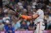 San Francisco Giants' Willy Adames follows through on a grand slam against the Seattle Mariners during the seventh inning of a baseball game, Friday, July 17, 2026, in Seattle. (AP Photo/Lindsey Wasson)