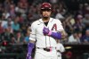 Arizona Diamondbacks' Ketel Marte reacts after a wild pitch in the first inning of a baseball game against the Milwaukee Brewers, Sunday, July 5, 2026, in Phoenix. (AP Photo/Rick Scuteri)