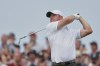 Rory McIlroy of Northern Ireland plays his tee shot on the 7th hole during the third day of the British Open Golf championships at Royal Birkdale golf club, in Southport, England, Saturday, July 18, 2026. (AP Photo/Peter Morrison)