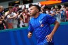 France's Kylian Mbappe jogs onto the field for warmups before the World Cup third-place playoff soccer match between France and England in Miami Gardens, Fla., Saturday, July 18, 2026. (AP Photo/Rebecca Blackwell)