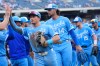 Kansas City Royals' Isaac Collins celebrates with teammates after their baseball game against the San Diego Padres, Saturday, July 18, 2026, in Kansas City, Mo. (AP Photo/Charlie Riedel)