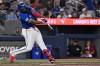 Toronto Blue Jays' Vladimir Guerrero Jr. (27) hits a double against the Chicago White Sox during fourth inning MLB baseball action in Toronto, Saturday, July 18, 2026. THE CANADIAN PRESS/Jon Blacker