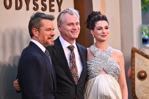 Matt Damon, from left, director Christopher Nolan, and Anne Hathaway attend the premiere of 