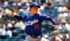 Los Angeles Dodgers' Yoshinobu Yamamoto delivers during the first inning of the first game of a baseball doubleheader against the New York Yankees, Sunday, July 19, 2026, in New York. (AP Photo/Noah K. Murray)
