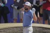 Cameron Young of the United States reacts after playing out of a bunker on the 18th green during the final day of the British Open Golf championships at Royal Birkdale golf club, in Southport, England, Sunday, July 19, 2026. (AP Photo/Peter Morrison)