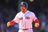 Boston Red Sox's Wilson Contreras celebrates after his two-run home as he runs the bases in the fifth inning of a baseball game against the Tampa Bay Rays, Sunday, July 19, 2026, in Boston. (AP Photo/Steven Senne)