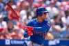 New York Mets' Juan Soto hits an RBI single during the sixth inning of a baseball game against the Philadelphia Phillies, Sunday, July 19, 2026, in Philadelphia. (AP Photo/Chris Szagola)