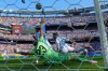 Spain's Ferran Torres (7) scores their first goal past Argentina goalkeeper Emiliano Martinez (23) during the World Cup final soccer match between Spain and Argentina in East Rutherford, N.J., near New York, Sunday, July 19, 2026. (AP Photo/Matt Slocum)