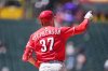 Cincinnati Reds'Tyler Stephenson gestures to the bullpen as he circles the bases after hitting a solo home run off Colorado Rockies pitcher Tanner Gordon in the fifth inning of a baseball game Sunday, July 19, 2026, in Denver. (AP Photo/David Zalubowski)