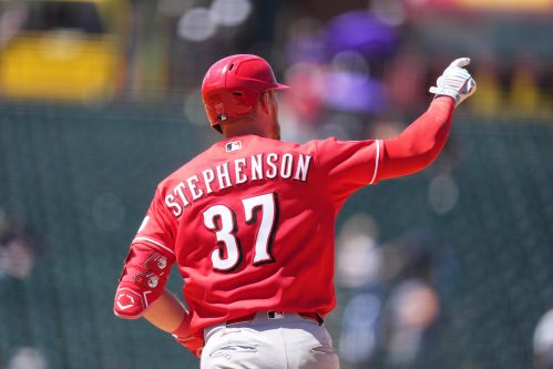 Cincinnati Reds'Tyler Stephenson gestures to the bullpen as he circles the bases after hitting a solo home run off Colorado Rockies pitcher Tanner Gordon in the fifth inning of a baseball game Sunday, July 19, 2026, in Denver. (AP Photo/David Zalubowski)