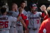 Washington Nationals' Dylan Crews (3) celebrates after hitting a home run during the fifth inning of a baseball game against the Athletics, Sunday, July 19, 2026, in West Sacramento, Calif. (AP Photo/Sara Nevis)