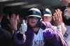 Colorado Rockies' Hunter Goodman gestures as he returns to the dugout after hitting a two-run home run off Cincinnati Reds relief pitcher Sam Moll in the eighth inning of a baseball game Sunday, July 19, 2026, in Denver. (AP Photo/David Zalubowski)