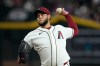 Arizona Diamondbacks starting pitcher Eduardo Rodriguez throws against the St. Louis Cardinals during the first inning of a baseball game, Sunday, July 19, 2026, in Phoenix. (AP Photo/Ross D. Franklin)