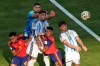 Argentina's Nicolas Tagliafico (3), Argentina's Nicolas Otamendi (19) try to score as Spain's Pedro Porro (12), Spain's Eric Garcia (4) and Spain goalkeeper Unai Simon (23) try to stop them during the World Cup final soccer match between Spain and Argentina in East Rutherford, N.J., near New York, Sunday, July 19, 2026. (AP Photo/Seth Wenig)