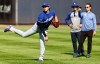 Los Angeles Dodgers' Shohei Ohtani, left, throws in the outfield before the second game of a baseball doubleheader against the New York Yankees, Sunday, July 19, 2026, in New York. (AP Photo/Noah K. Murray)