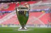 FILE - The trophy is displayed on the pitch before the Champions League final soccer match between Paris Saint-Germain and Arsenal in Budapest, Hungary, on May 30, 2026. (AP Photo/Andreea Alexandru, File)