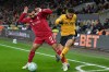 FILE - Wolverhampton Wanderers' Joao Gomes, right, clears the ball as Liverpool's Mohamed Salah, left, challenges during the English Premier League soccer match between Wolverhampton Wanderers and Liverpool in Wolverhampton, England, Tuesday, March 3, 2026. (AP Photo/Dave Shopland, File)
