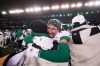Saskatchewan Roughriders' C.J. Avery (35), left, hugs teammate Jayden Dalke (38) as they celebrate their win over the Montreal Alouettes in the 112th CFL Grey Cup, in Winnipeg on Sunday, Nov. 16, 2025. THE CANADIAN PRESS/Darryl Dyck