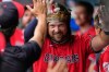 Cleveland Guardians' Rhys Hoskins celebrates in the dugout after hitting a home run in the first inning of a baseball game against the Minnesota Twins in Cleveland, Monday, July 20, 2026. (AP Photo/Sue Ogrocki)