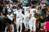 New York Yankees' Cody Bellinger, center left, and Jazz Chisholm Jr. (13) celebrate after Chisholm's home run against the Pittsburgh Pirates during the first inning of a baseball game, Monday, July 20, 2026, in New York. (AP Photo/Noah K. Murray)