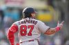 Washington Nationals' Andrés Chaparro gestures to the bullpen as he circles the bases after hitting a three-run home run off Colorado Rockies starting pitcher Kyle Freeland in the first inning of a baseball game Monday, July 20, 2026, in Denver. (AP Photo/David Zalubowski)