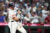 Seattle Mariners' Cal Raleigh hits a grand slam against the Cincinnati Reds during the seventh inning of a baseball game, Monday, July 20, 2026, in Seattle. (AP Photo/Lindsey Wasson)