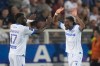 FILE - Auxerre's Lassine Sinayoko, left, celebrates with Auxerre's Nuno da Costa after scoring his side's opening goal during the French League One soccer match between Auxerre and Paris Saint Germain, at the Abbe Deschamps stadium in Auxerre, central France, Sunday, May 21, 2023. (AP Photo/Thibault Camus, File)