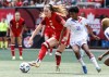 Canada's Jordyn Huitema (9) makes the pass against Haiti Roseline Éloissant (11) during second half soccer action in Winnipeg, Saturday, May 31, 2025. THE CANADIAN PRESS/John Woods