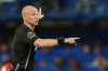 FILE - Referee Anthony Taylor makes a call during the English Premier League soccer match between Chelsea and Arsenal in London, Nov. 30, 2025. (AP Photo/Ian Walton, File)