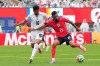 England's Morgan Rogers (17) and Panama's Andres Andrade (16) battle for the ball during the World Cup Group L soccer match between Panama and England in East Rutherford, N.J., near New York, Saturday, June 27, 2026. (AP Photo/Yuki Iwamura)