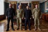 In this photo provided by the Ukrainian Presidential Press Office, from left, acting Minister of Defense Major General Yevhen Khmara, former Commander-in-Chief of the Ukrainian Armed Forces Oleksandr Syrskyi, Ukrainian President Volodymyr Zelenskyy and new commander-in-chief of Ukraine's Armed Forces Mykhailo Drapatyi, pose for a photo during their meeting in Kyiv, Ukraine, Wednesday, July 22, 2026. (Ukrainian Presidential Press Office via AP)