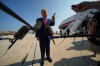 President Donald Trump speaks to reporters before boarding Air Force One, Wednesday, July 22, 2026, at Joint Base Andrews, Md. (AP Photo/Julia Demaree Nikhinson)
