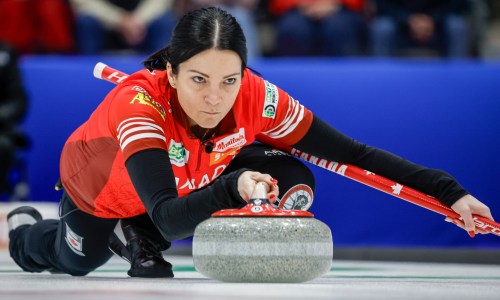 Team Canada skip Kerri Einarson delivers a stone against Switzerland during the gold medal draw at the World Women’s Curling Championship in Calgary, Sunday, March 22, 2026. THE CANADIAN PRESS/Jeff McIntosh