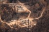 Wildfire damage is pictured from the air in Collins First Nation, a small, remote Ojibwa community located in northwestern Ontario, about 250 km north of Thunder Bay, Ont., on Wednesday, July 22, 2026. THE CANADIAN PRESS/Chris Young