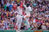 Boston Red Sox's Ceddanne Rafaela, right, is congratulated by Wilyer Abreu after hitting a solo home run in the fourth inning during the first baseball game of a doubleheader against the Baltimore Orioles, Wednesday, July 22, 2026, in Boston. (AP Photo/Charles Krupa)
