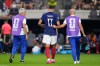 France's William Saliba (17) is led off the pitch after being injured during the World Cup semifinal soccer match between France and Spain in Arlington, Texas, near Dallas, Tuesday, July 14, 2026. (AP Photo/Eric Gay)