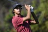 FILE - Charlie Woods tees off on the fourth hole and scores a hole-in-one during the final round of the PNC Championship golf tournament, Dec. 22, 2024, in Orlando, Fla. (AP Photo/Phelan M. Ebenhack, File)