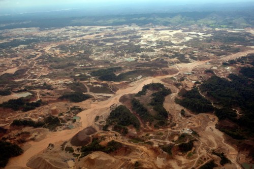 FILE - This aerial photo shows tailings produced by informal mining in Peru's Madre de Dios region, Sept. 13, 2013. (AP Photo/Rodrigo Abd, File)