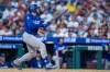 Los Angeles Dodgers' Max Muncy hits a two-run home run during the sixth inning of a baseball game against the Philadelphia Phillies, Wednesday, July 22, 2026, in Philadelphia. (AP Photo/Chris Szagola)