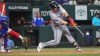 Chicago White Sox's Chase Meidroth, right, hits a run scoring single in front of Texas Rangers catcher Elias Díaz during the second inning of a baseball game, Wednesday, July 22, 2026, in Arlington, Texas. (AP Photo/LM Otero)