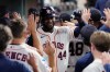 Houston Astros' Yordan Alvarez is congratulated in the dugout after hitting a two-run home run during the eighth inning of a baseball game against the Miami Marlins, Wednesday, July 22, 2026, in Houston. (AP Photo/Kevin M. Cox)