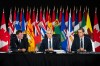 Prime Minister Mark Carney, centre, addresses Canada's premiers with Canada-U.S. Trade Minister Dominic LeBlanc, left, and Prince Edward Island Premier Rob Lantz during First Ministers meetings in Charlottetown on Thursday July 23, 2026. THE CANADIAN PRESS/Darren Calabrese