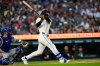 Detroit Tigers' James Outman hits a three-run home run against the Kansas City Royals during the seventh inning of a baseball game Thursday, July 23, 2026, in Detroit. (AP Photo/Paul Sancya)