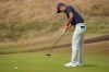 Michael Kim of the United States putts on the 3rd green during the second day of the British Open Golf championships at Royal Birkdale golf club, in Southport, England, Friday, July 17, 2026. (AP Photo/David Goldman)