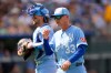 Kansas City Royals' Matt Quatraro (33) walks to the dugout after making a pitching change during the fifth inning of a baseball game against the San Diego Padres, Saturday, July 18, 2026, in Kansas City, Mo. (AP Photo/Charlie Riedel)