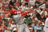 Cincinnati Reds' Eugenio Suárez hits a 2-run home run against the St. Louis Cardinals during the seventh inning of a baseball game, Friday, July 24, 2026, in St. Louis. (AP Photo/Jeff Le)