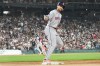 Houston Astros' Cam Smith runs the bases after hitting a two-run homer against the Chicago White Sox during the sixth inning of a baseball game Friday, July 24, 2026, in Chicago. (AP Photo/David Banks)
