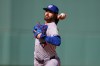 Toronto Blue Jays' Dylan Cease starting pitcher delivers during the first inning of a baseball game against the Boston Red Sox, Saturday, July 25, 2026, in Boston. (AP Photo/Charles Krupa)